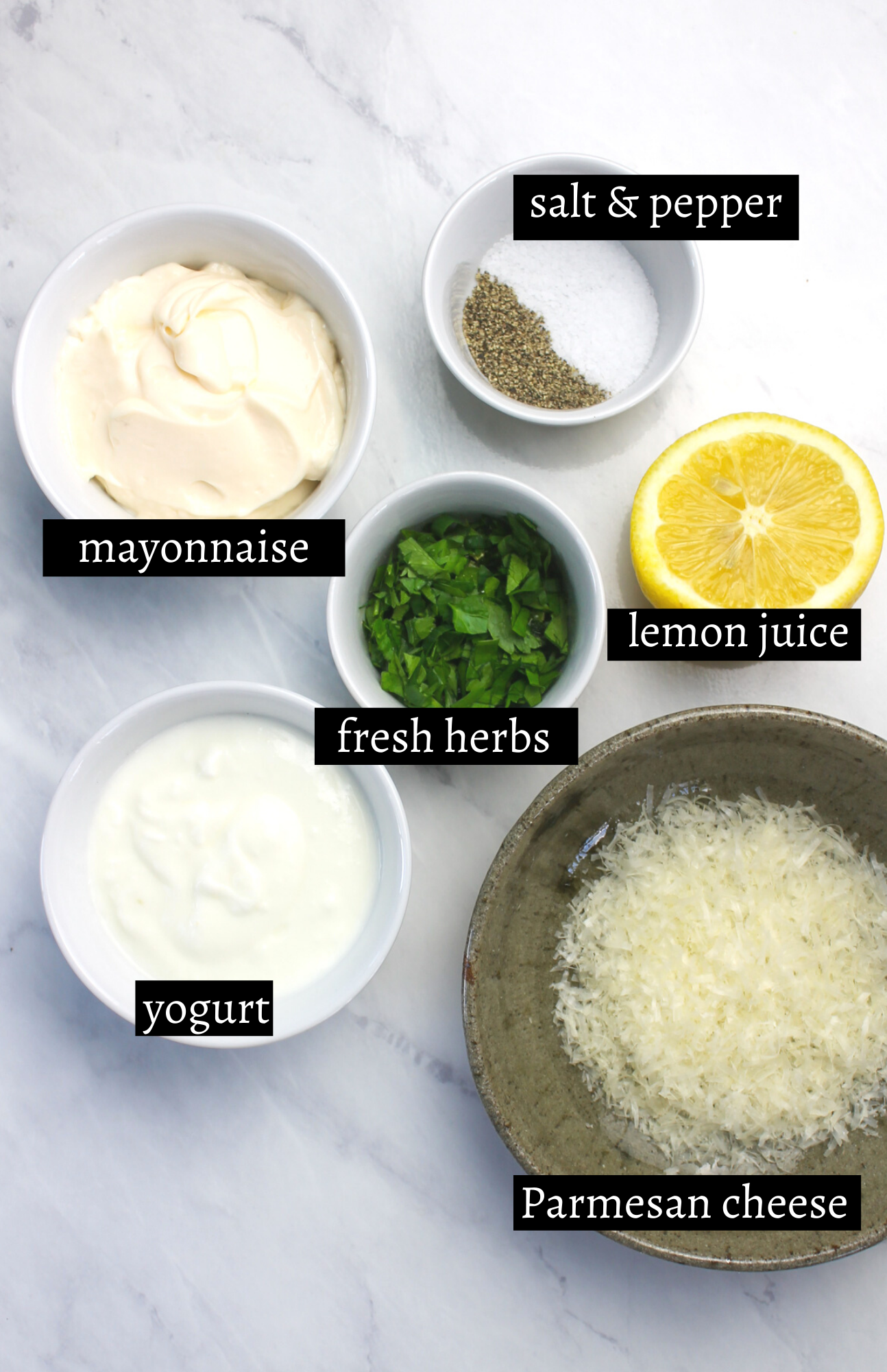 Labeled ingredients for parmesan herb veggie dip.