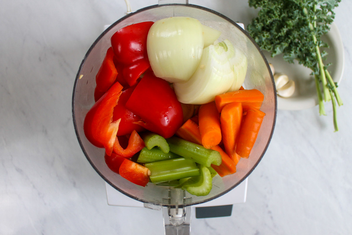 Vegetables to make Italian Sausage Bolognese in a food processor.