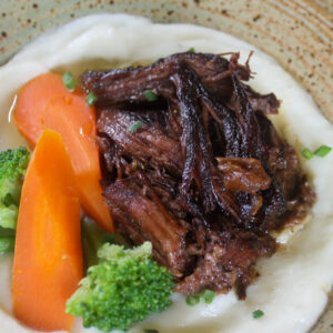 Oven baked chuck roast with sweet and savory flavor.