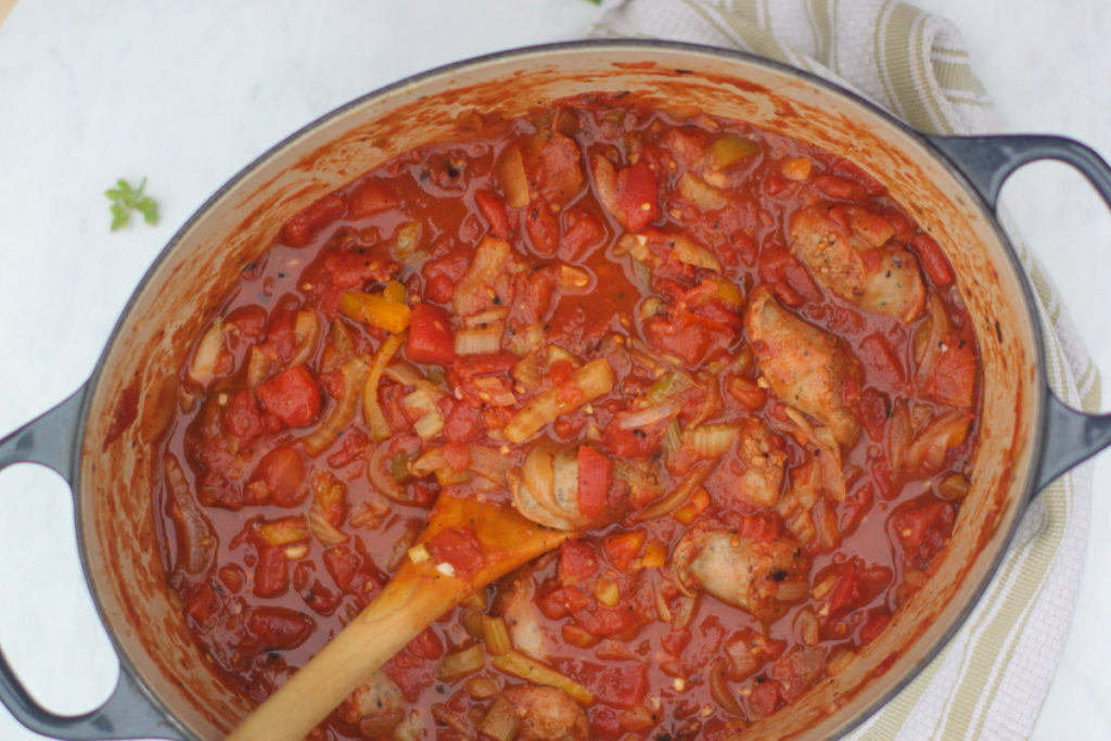 Hearty Marinara Sauce Recipe with sausage, onions, peppers and fennel.