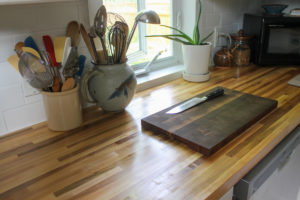 Knife and Cutting board on the new butcher countertop in our new kitchen.