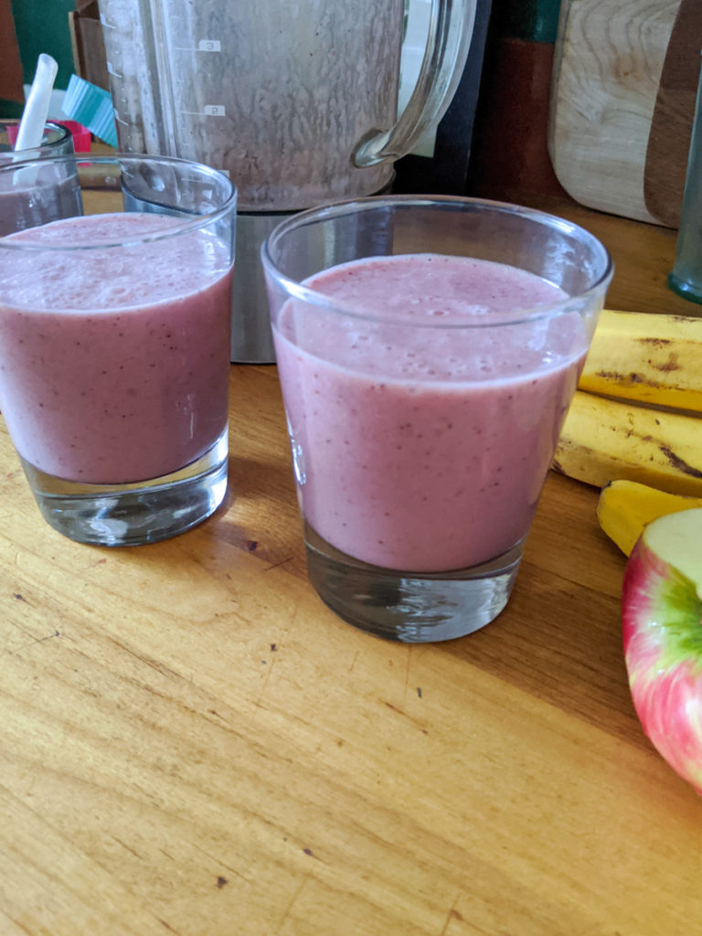 Smoothies made from leftover frozen fruit, a smoothie bucket.