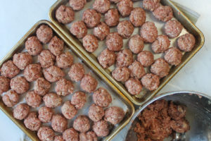 Meal prep large batch of raw meatballs