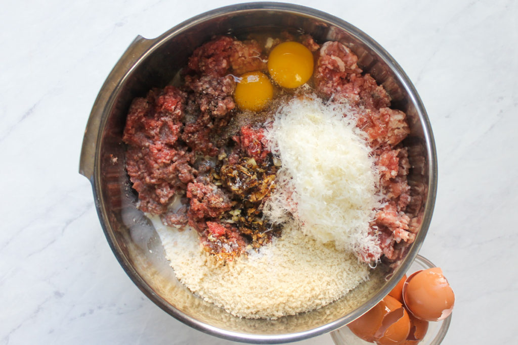 Meatballs ingredients ready to be mixed in a bowl