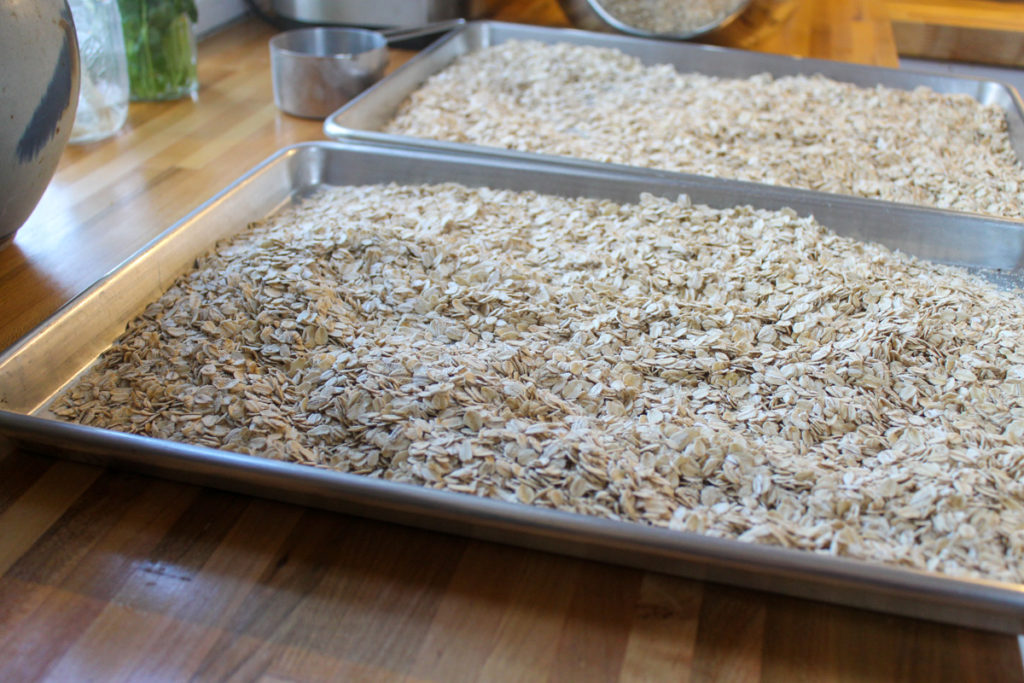 Two sheet pans of homemade instant oatmeal ready to bake.