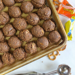 Peanut Better Nutella Protein Balls on a sheet pan made with a portion scoop.