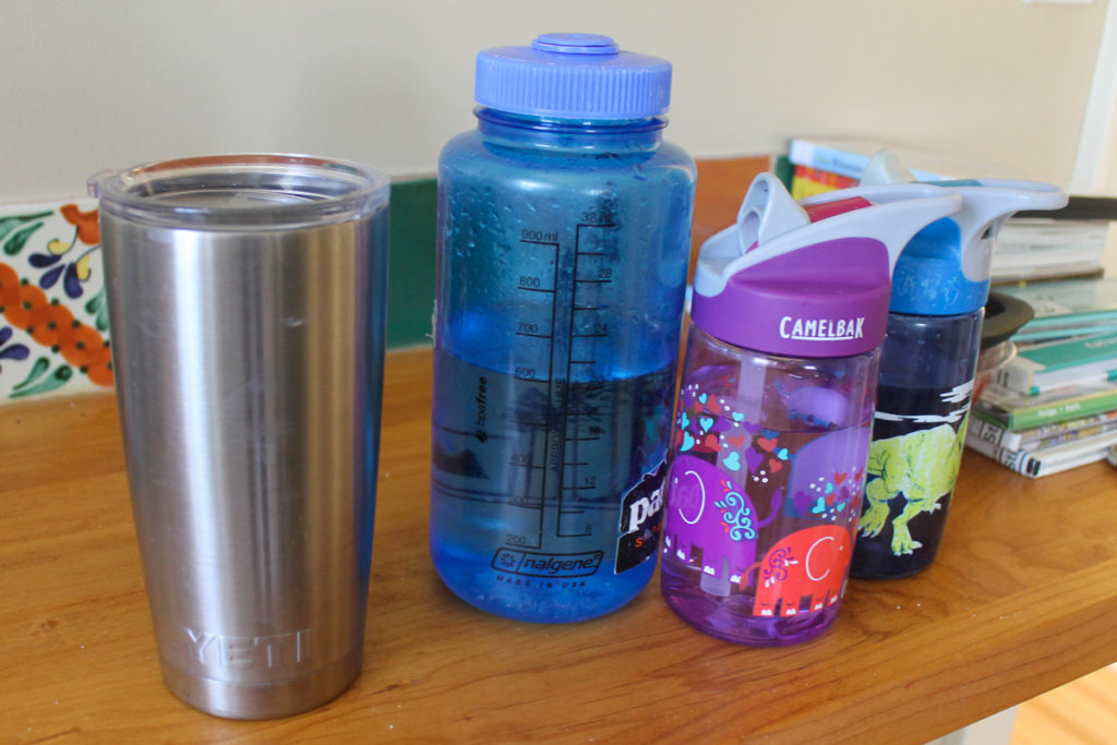 Reusable water bottles and coffee mugs for kids and adults.