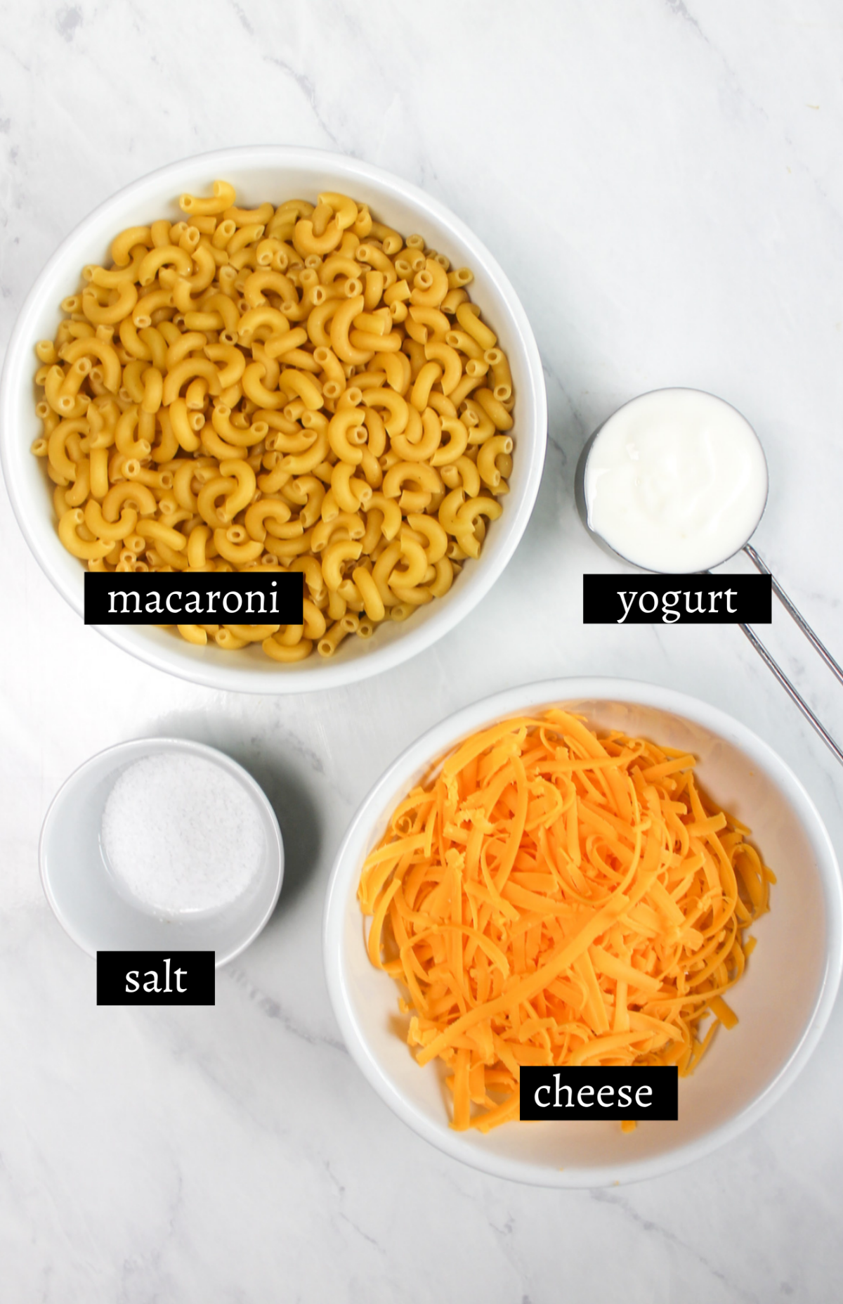 Labeled ingredients for mac and cheese for kids.