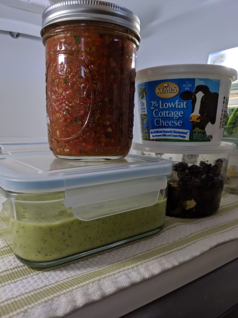 Healthy snacks in the fridge including Healthy Greens Hummus Healthy snacks in the fridge including Healthy Greens Hummus