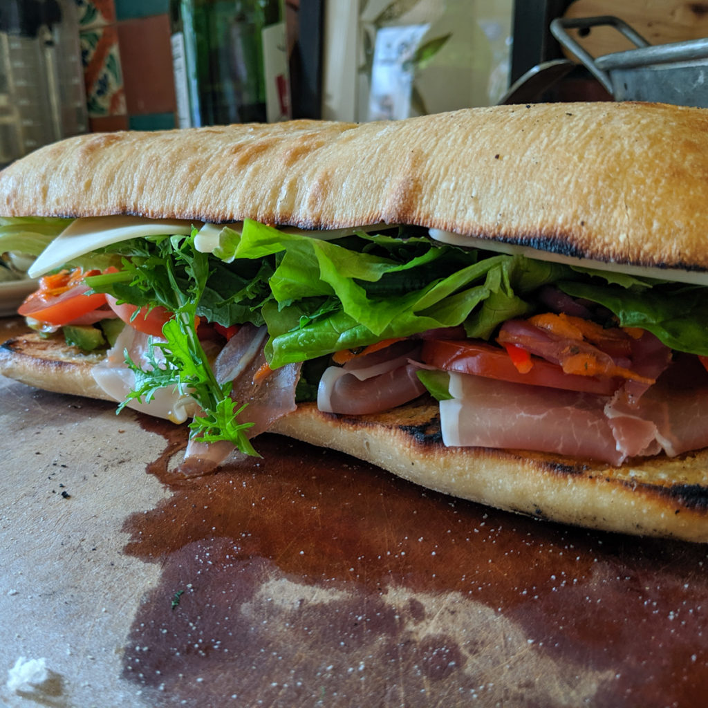 Italian Sub with fresh giardiniera sandwich on ciabatta.