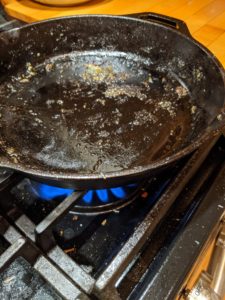 How to Clean a Cast Iron Skillet Step 1, get it hot