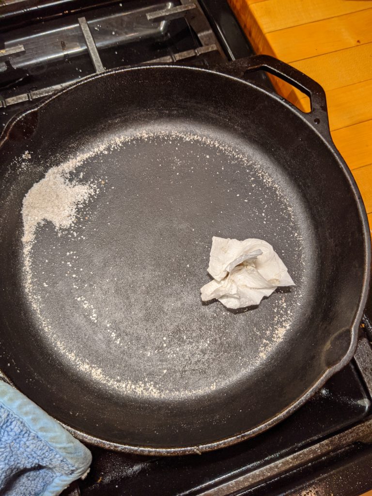 Cleaning a Cast Iron Skillet Step 4 rub with kosher salt