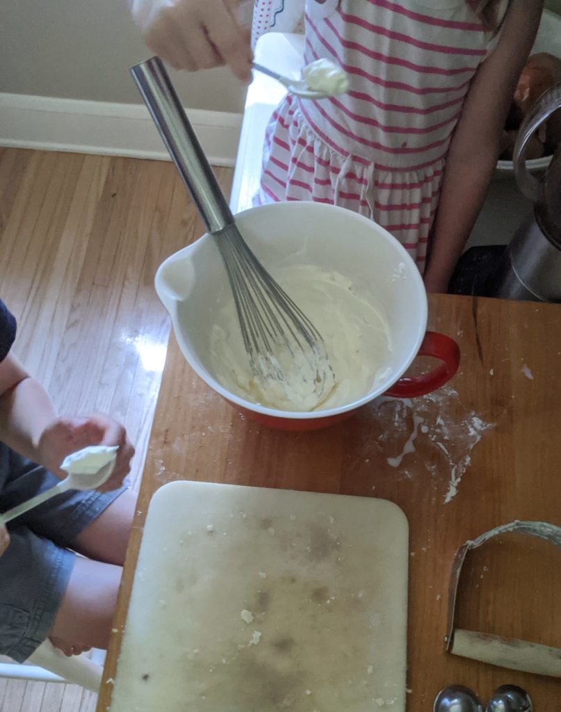 Kids making homemade whipped cream