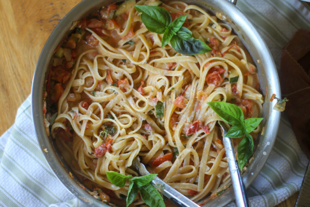 Pink harvest pasta in a fresh tomato cream sauce.