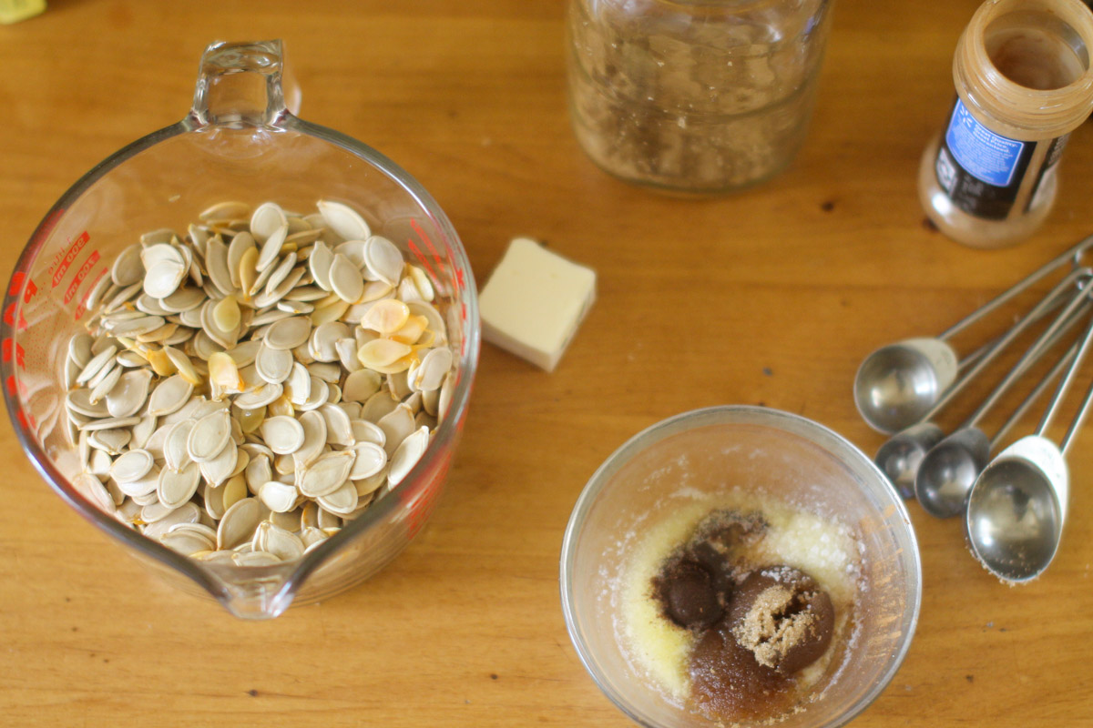 Ingredients on the counter for Sweet and Salty Roasted Pumpkin Seeds.