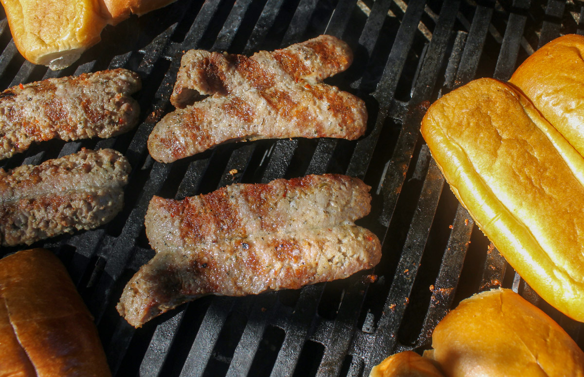 Italian Sausages and Hoagie Buns on the grill.