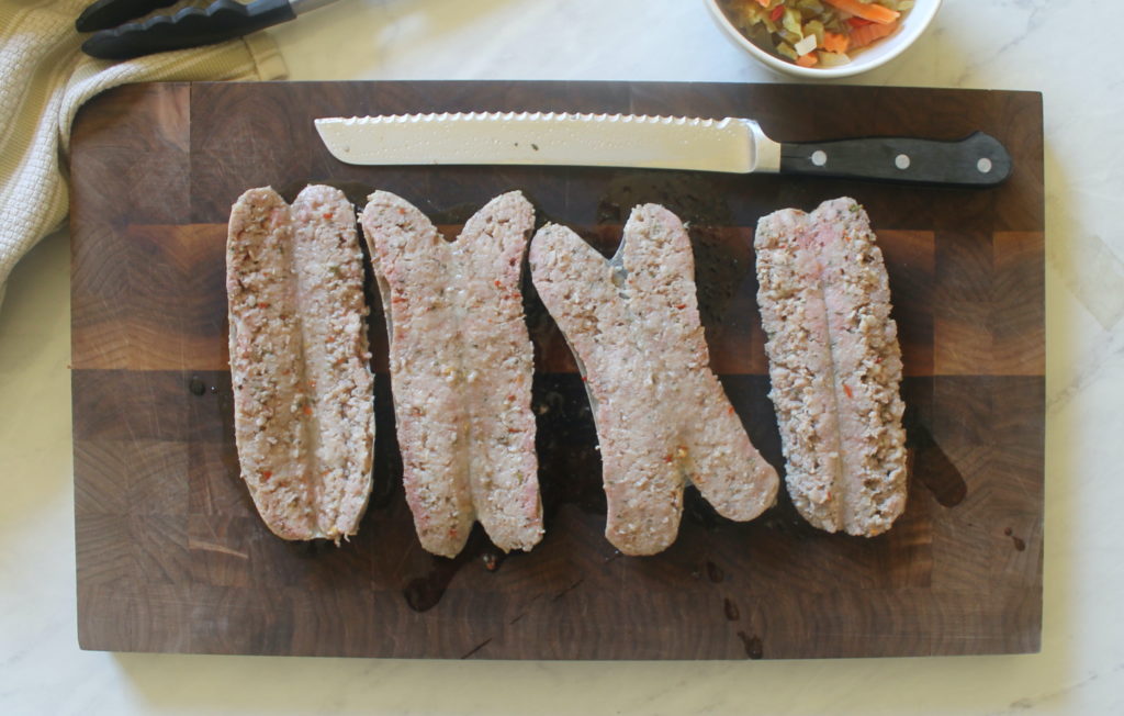 Split sausages with a serrated knife