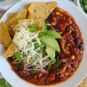 A bowl of Southwest Chicken Chili made in a Crock Pot with toppings.
