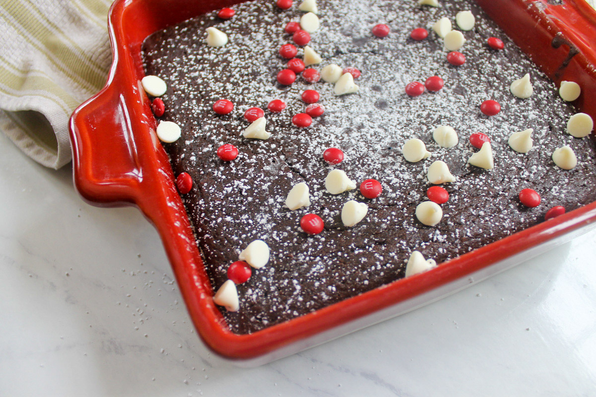 Valentine's Day themed black bean brownies with red M&M's and white chocolate chips.