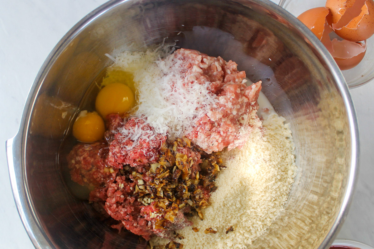 Norwegian meatballs meat mixture in a bowl ready to mix.