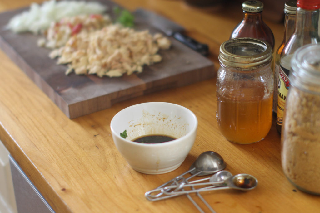 Prepping ingredients to make the filling for chicken apple potstickers.