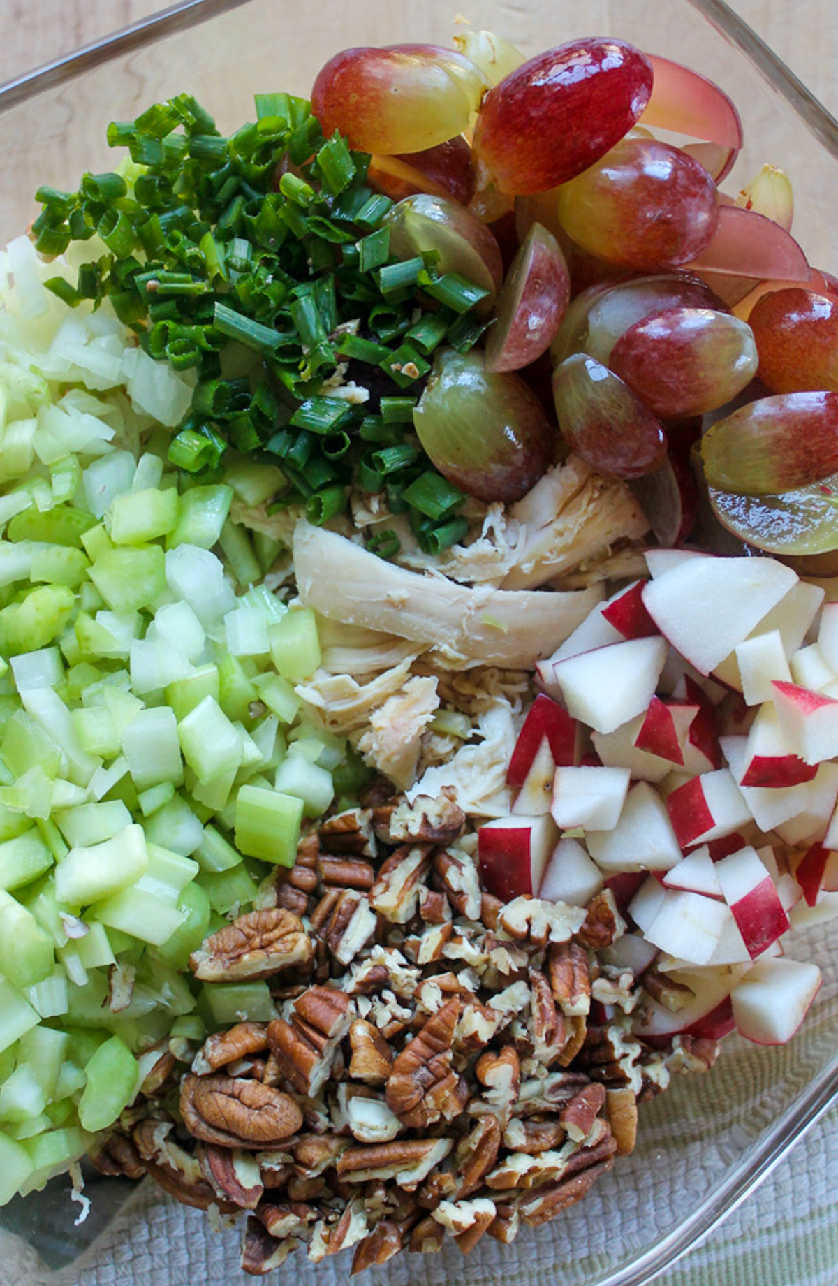 Chicken Salad with Grapes and Apples ingredients unmixed in a bowl.