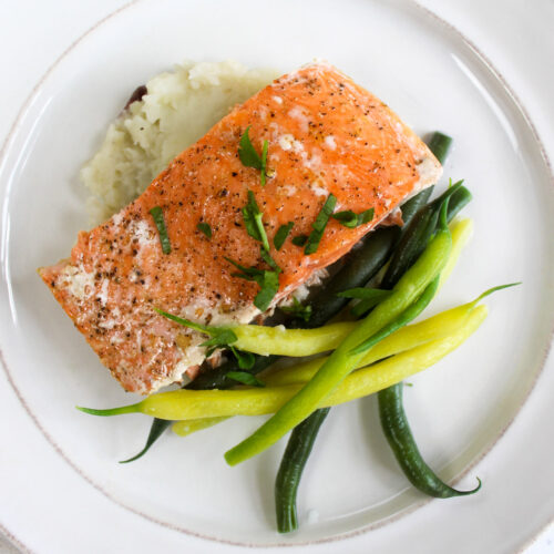 Baked Wild Caught Salmon with mashed potatoes and green beans.