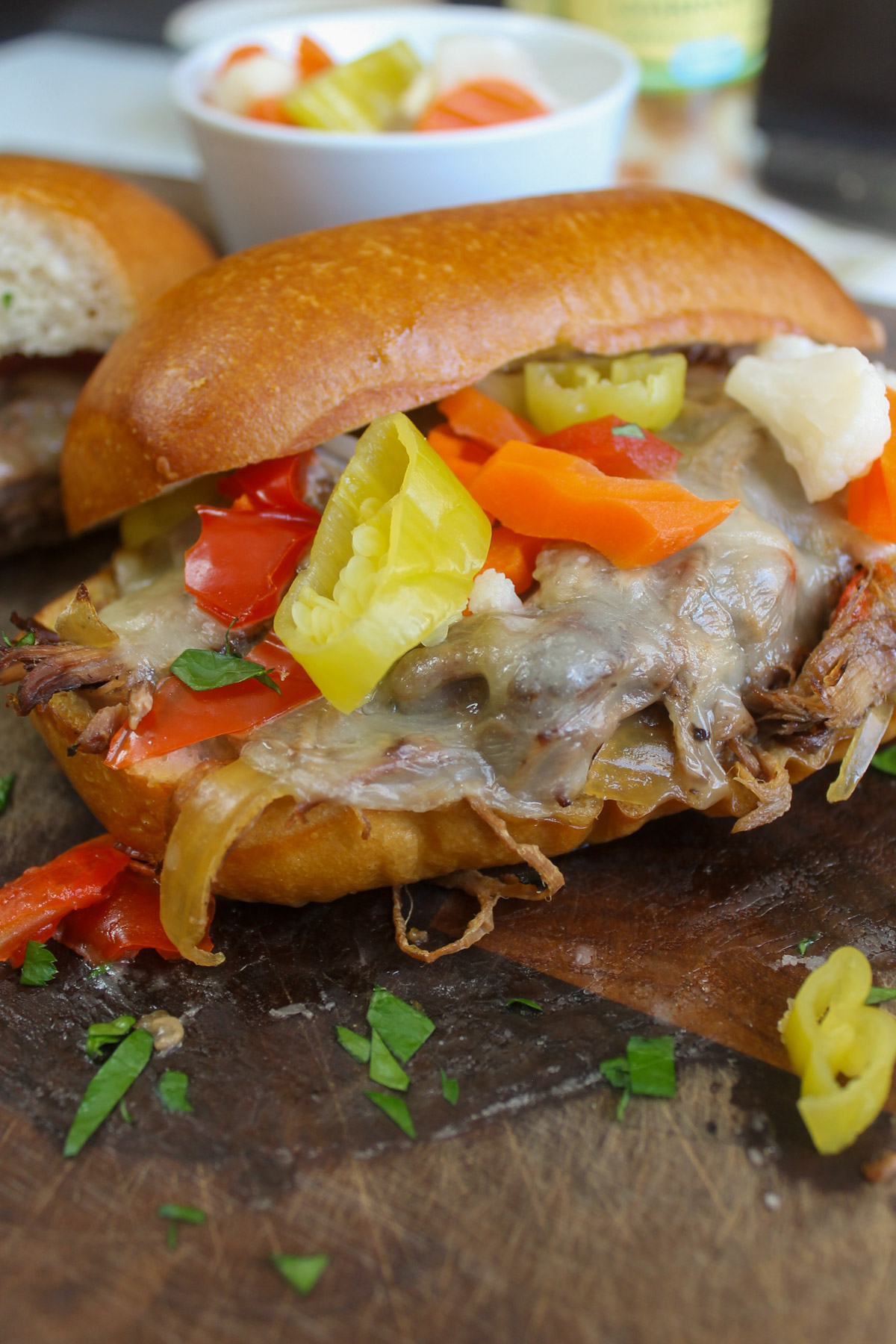 Italian Beef Melts with Provolone cheese and giardiniera.