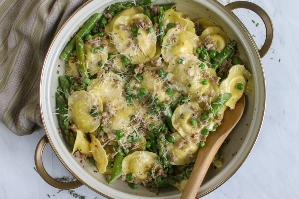 Finished ravioli with asparagus dish.