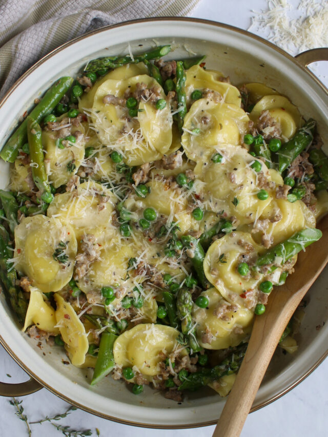 Creamy Asparagus Ravioli with Sausage & Peas