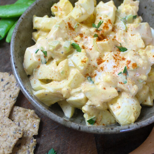 Bowl of egg salad with paprika.