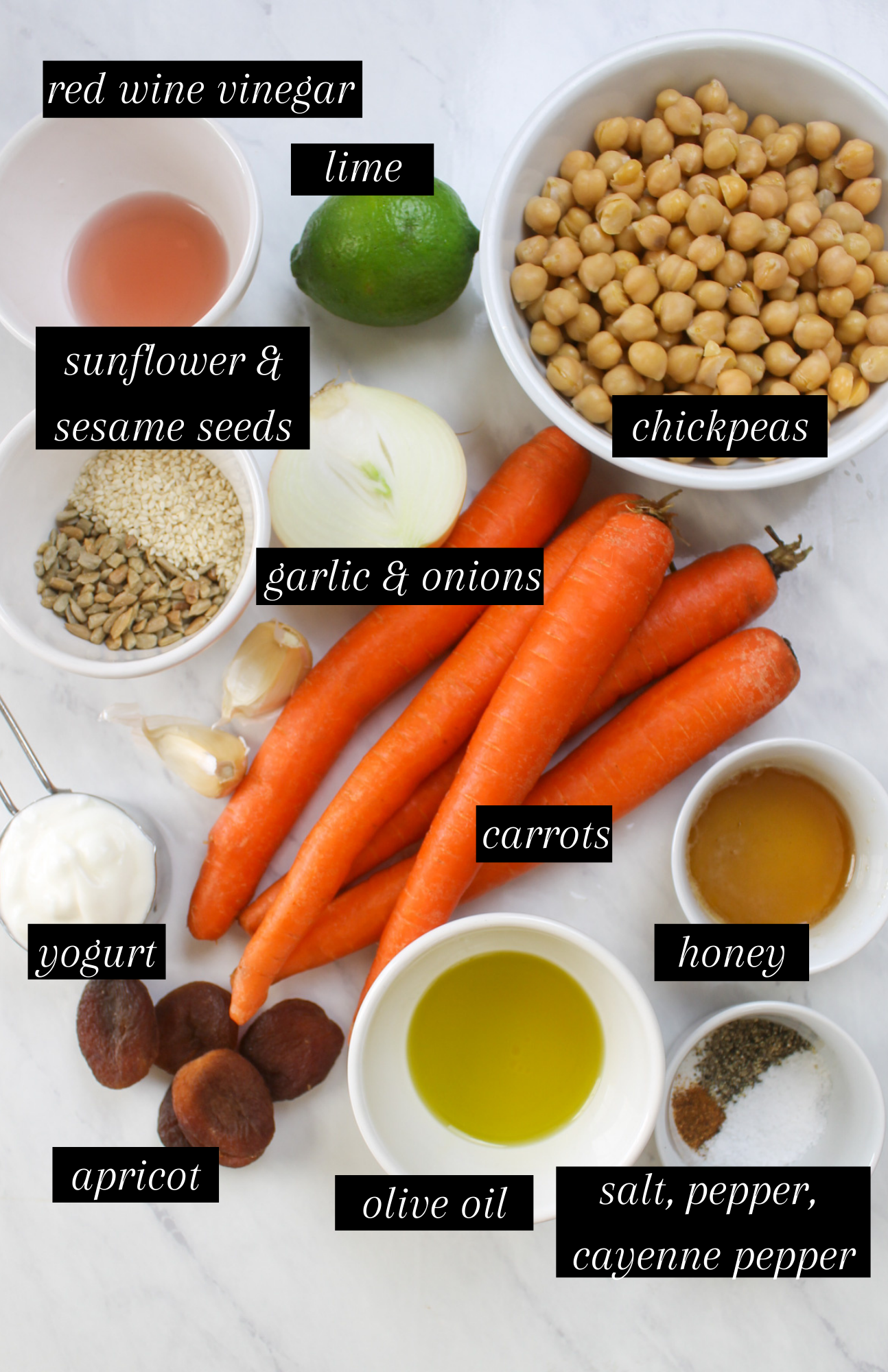 Labeled ingredients for roasted carrot hummus.