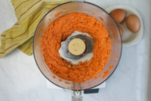 Carrot and banana pureed in a food processor