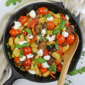 Creamy gnocchi with goat cheese and lots of garden vegetables.