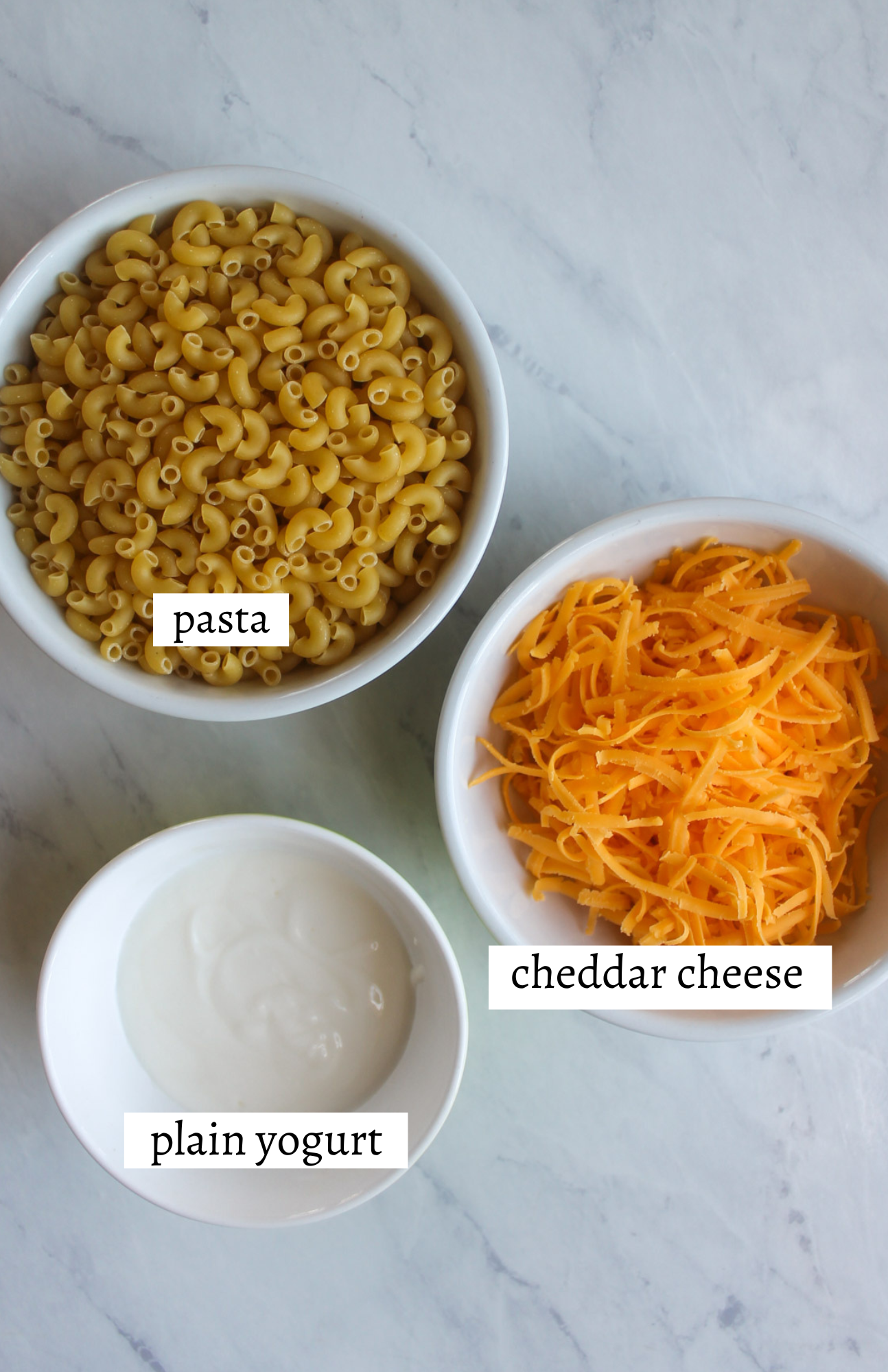 Labeled ingredients for mac and cheese for kids.