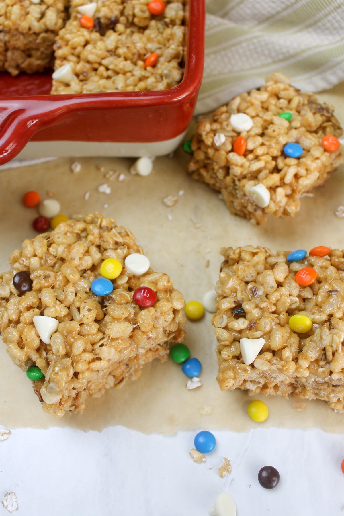 Rice Krispie peanut butter treats on parchment paper.