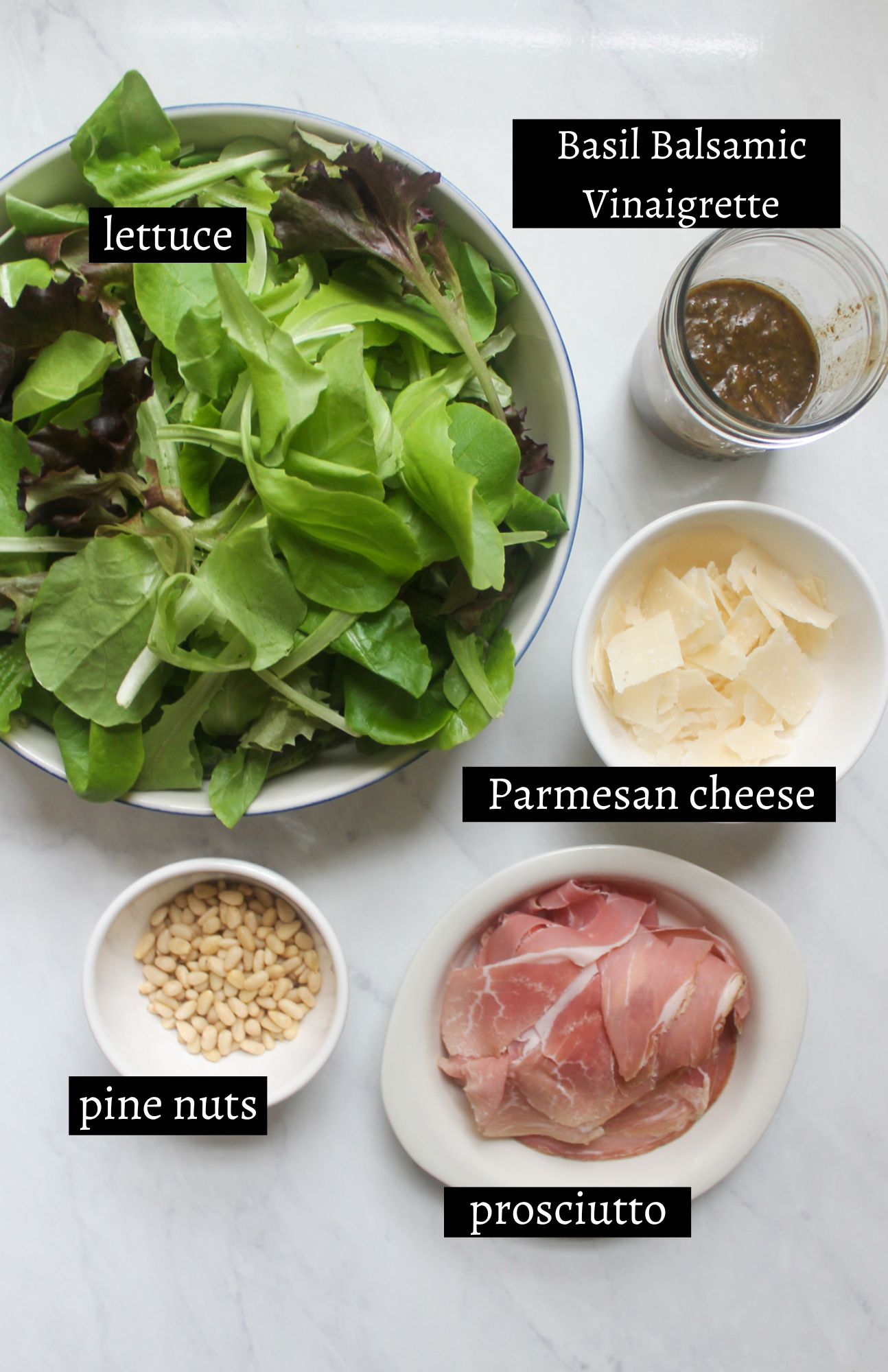 Labeled ingredients for Prosciutto Parmesan Salad with Basil Balsamic Vinaigrette.