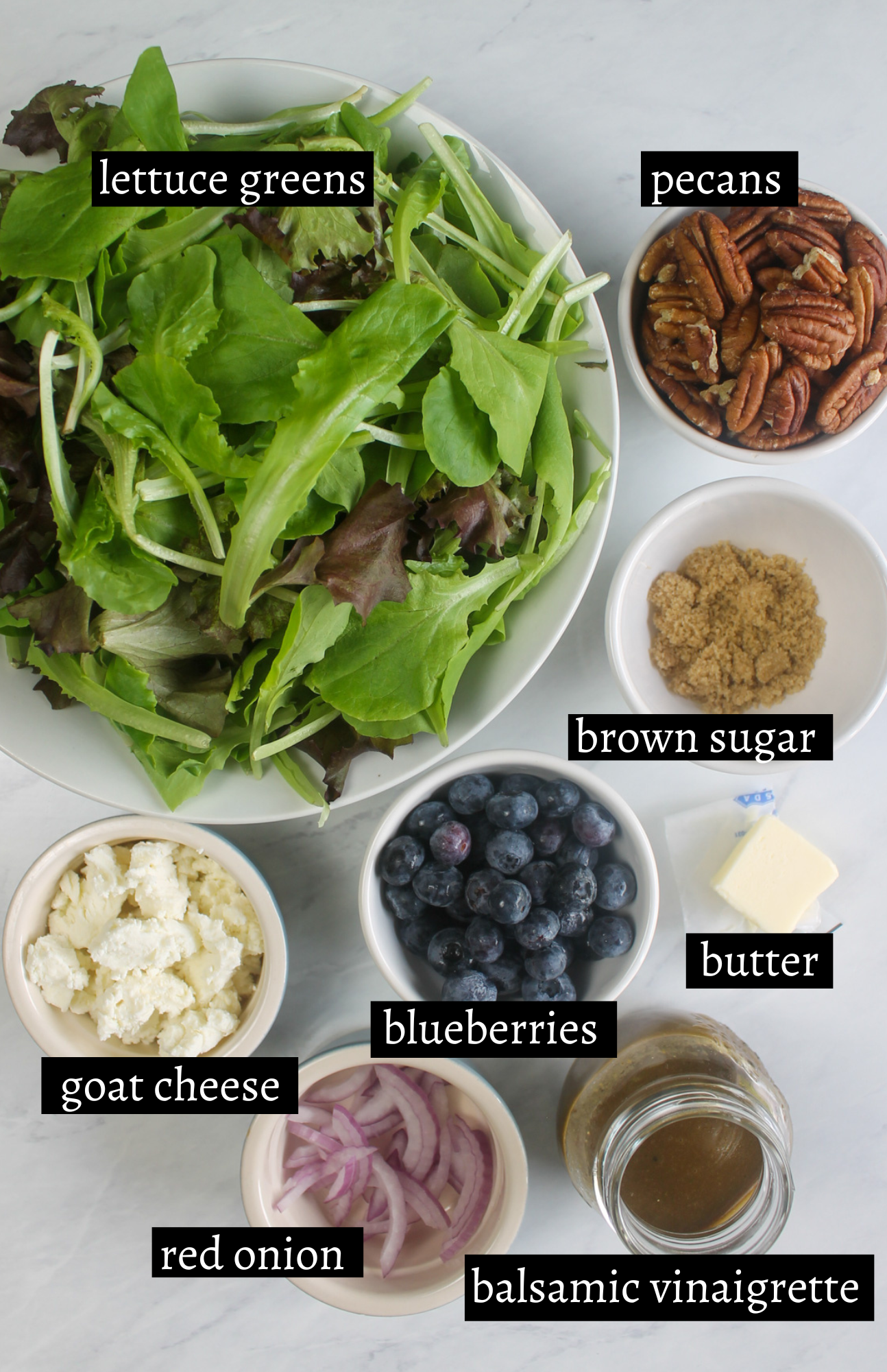 Labeled ingredients for blueberry goat cheese salad.