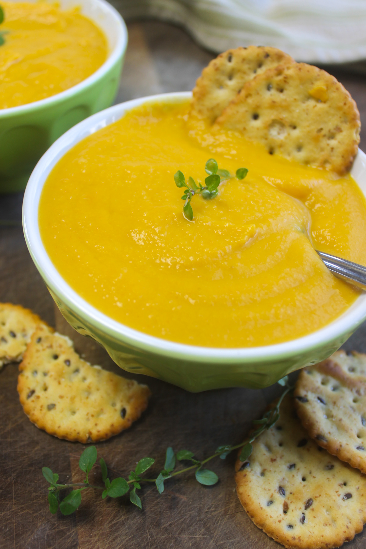 Butternut squash carrot soup with seedy crackers.
