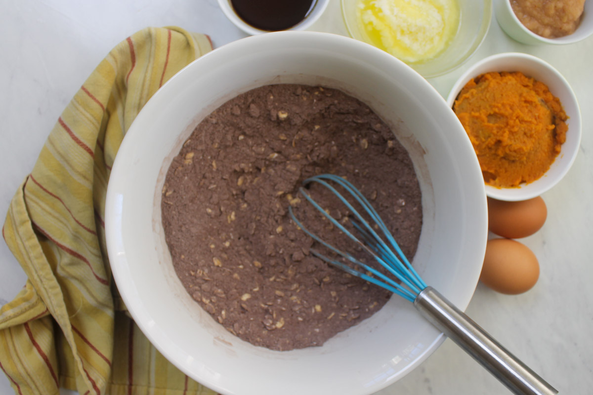 Mixing the dry ingredients in a bowl.