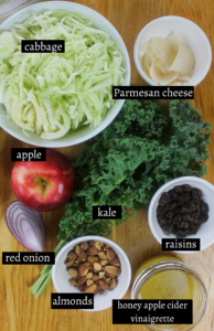 Labeled ingredients for Kale Apple Slaw with Honey Apple Cider Vinaigrette.