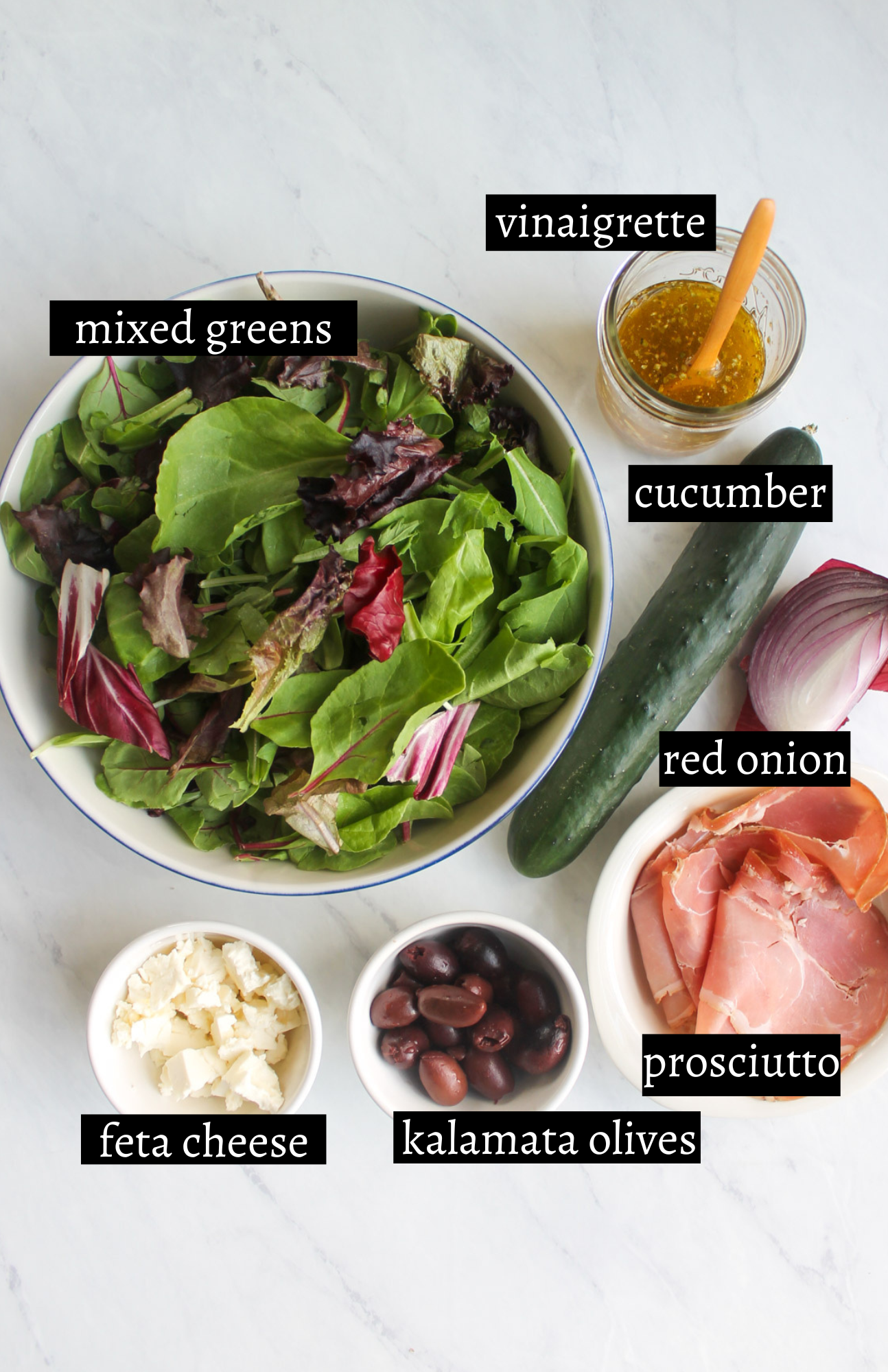 Labeled ingredients for Italian mixed greens salad with crispy prosciutto.