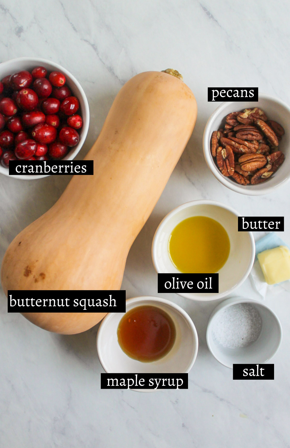 Labeled ingredients for Maple Roasted Butternut Squash with Cranberries and Pecans