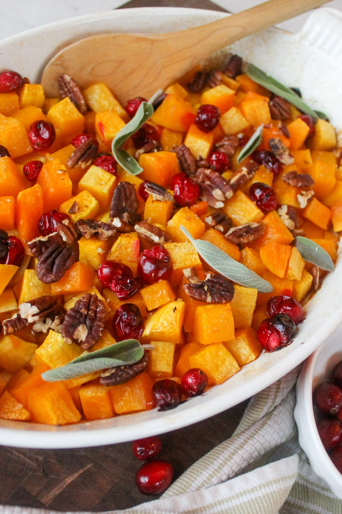 Maple glazed butternut squash roasted with cranberries.