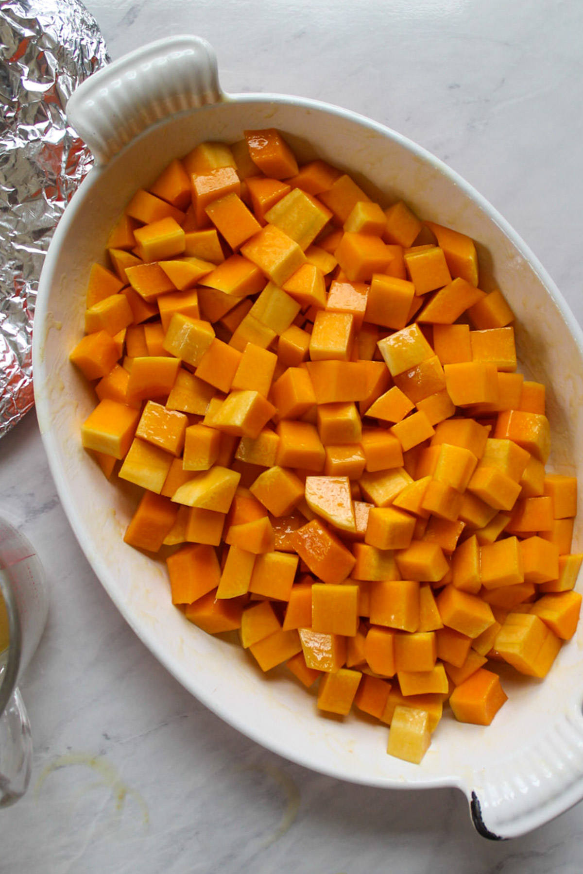 Cubed butternut squash tossed in the maple butter glaze.