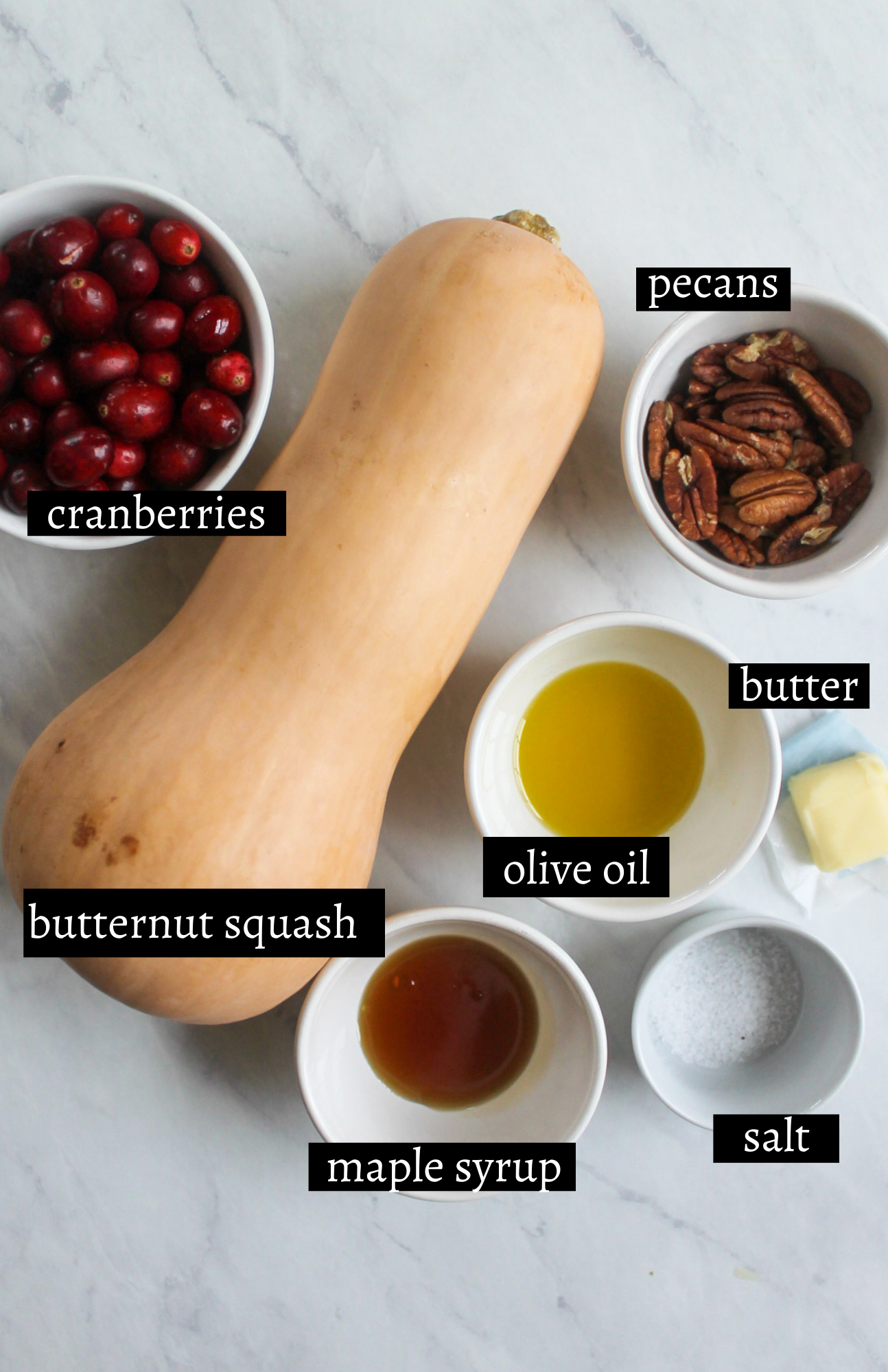 Labeled ingredients for Maple Roasted Butternut Squash with Cranberries and Pecans