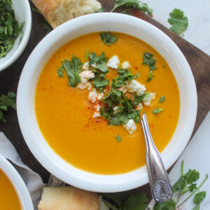 Curried carrot ginger soup made with garbanzo beans and coconut milk.