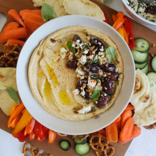 Mediterranean hummus topped with pine nuts, olives and feta cheese mixture.