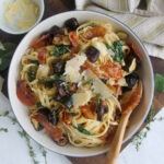 Mushroom zucchini pasta with crispy prosciutto.