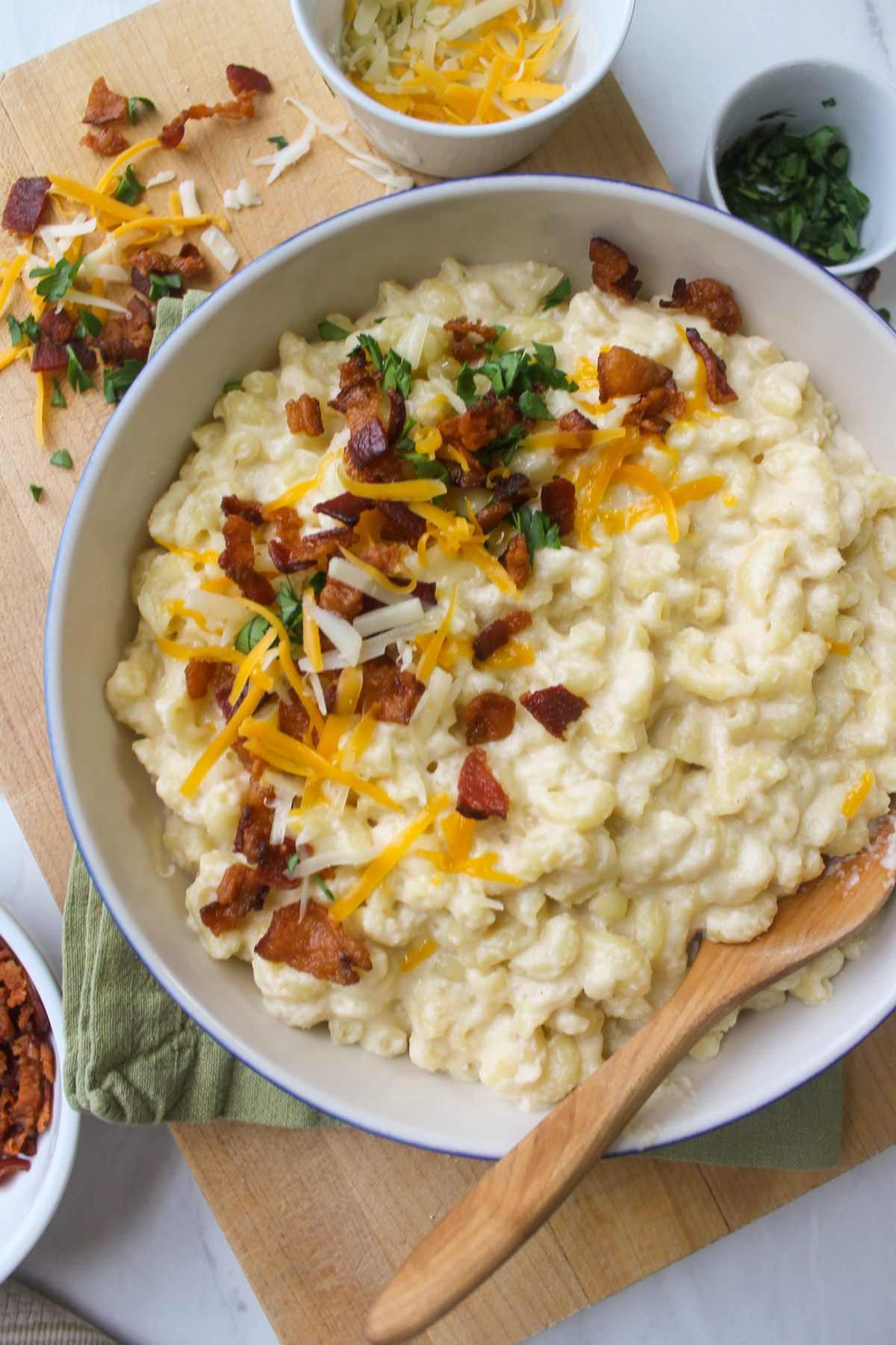 A serving bowl of bacon cauliflower mac and cheese.